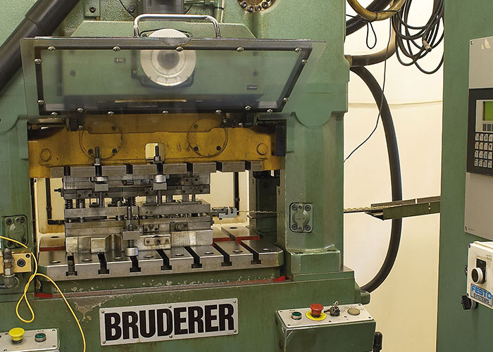 Close up of metal stamping machine